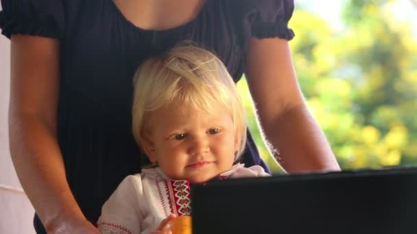 Baby girl watching cartoon — Stock Video © slavastock #64139047 Baby girl watching cartoon — Stock Video © slavastock #64139047