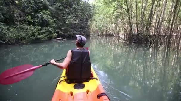 Man travelling   in kayak — Stock Video