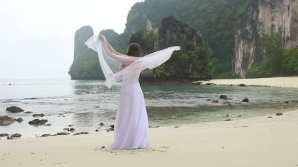 Beautiful bride on beach — Stock Video