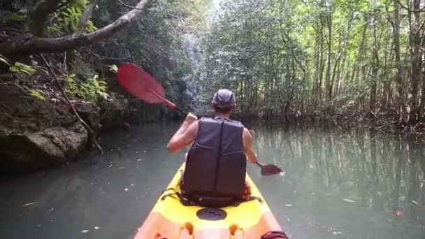 Man travelling   in kayak — Stock Video