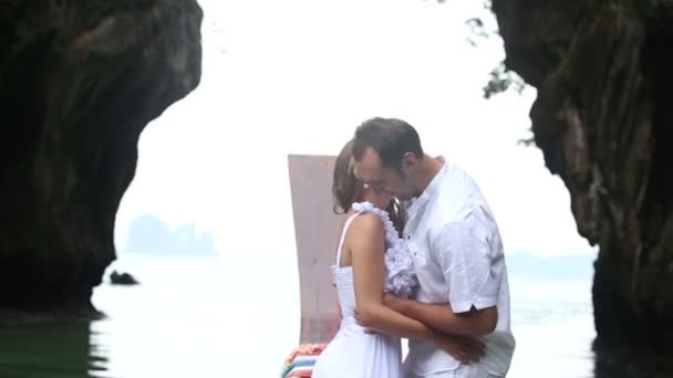 Bride and groom on boat in sea — Stock Video