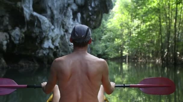 Man travelling   in kayak — Stock Video