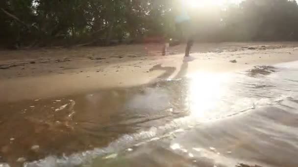 Girl running on sand beach — Stock Video