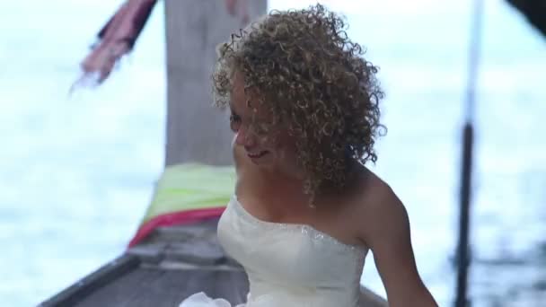 Young blonde bride on boat — Stock Video