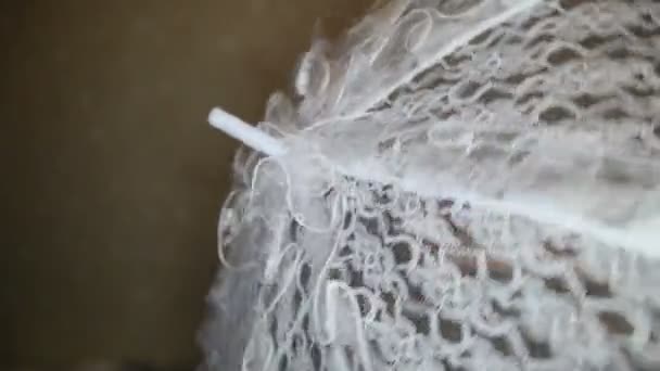 View of whirling wedding lace umbrella — Stock Video