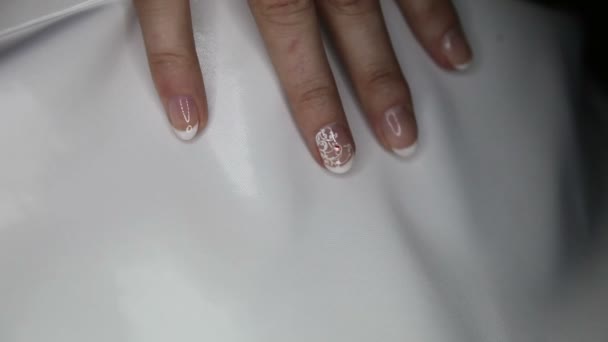 View of moving bride fingers with manicure — Stock Video