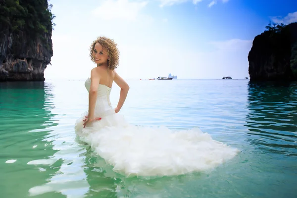 Bride in azure sea — Stock Photo, Image