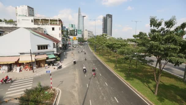 In background Bitexco Financial Tower — Stock Video