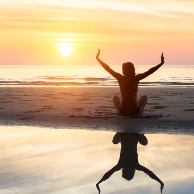 Female silhouette doing exercise