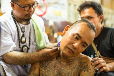 Kimliği belirsiz katılımcı Wai Kroo