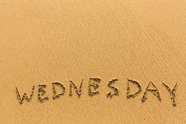 Wednesday word on sand — Stock Photo, Image