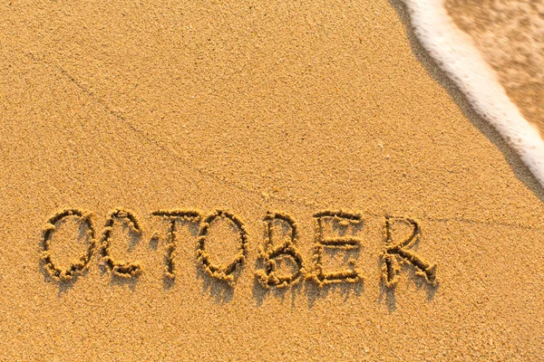October word  on sand — Stock Photo, Image