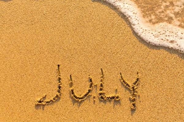 July word  on sand — Stock Photo, Image