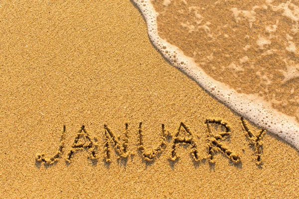 Ιανουαρίου λέξη στην άμμο — Φωτογραφία Αρχείου