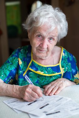 woman pays the utility bills.