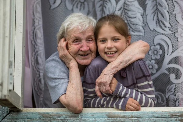 Happy grandmother and granddaughter — Stock Photo, Image