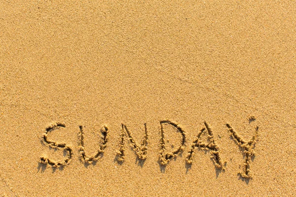 Sunday lettering on sand — Stock Photo, Image