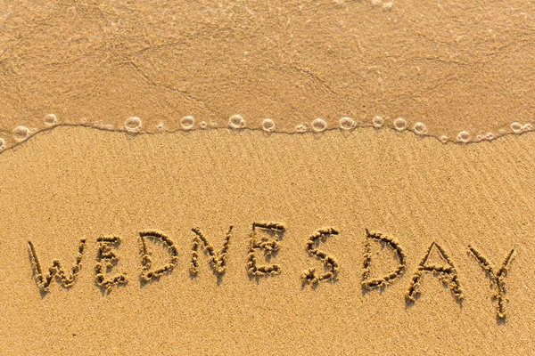 Wednesday - hand-written on the sand — Stock Photo, Image