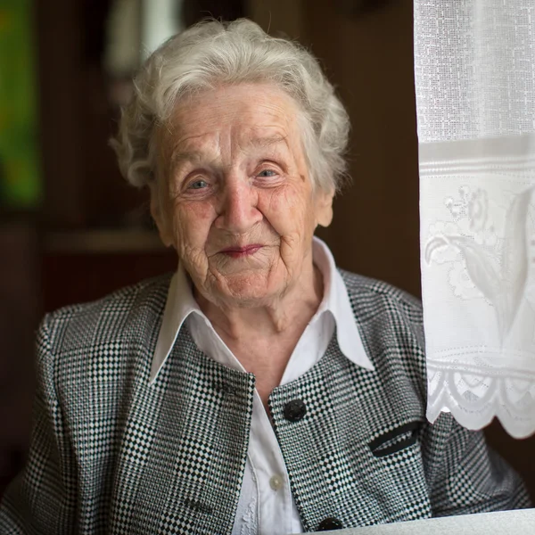 Portrait of elderly woman — Stock Photo, Image