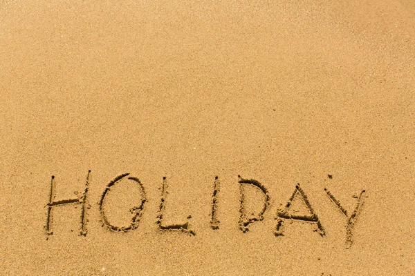 Holiday - inscription by hand Royalty Free Stock Photos