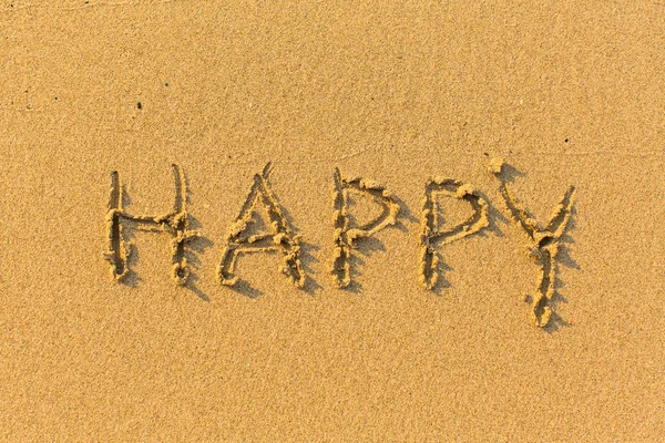 Happy - inscription on  beach — Stock Photo, Image