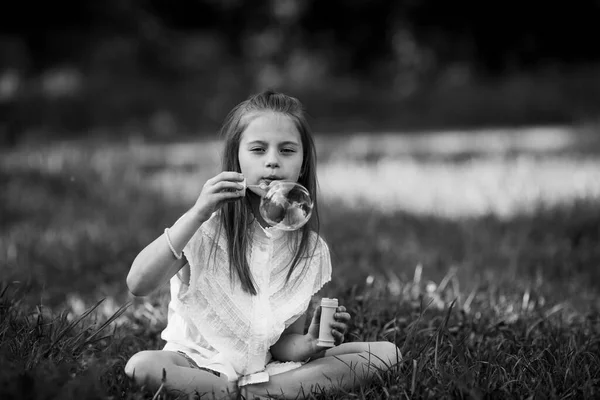 Little Girl Inflates Soap Bubbles Outdoors Black White Photo — Stock Photo, Image