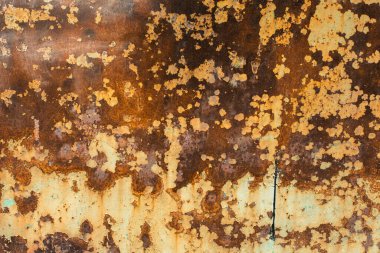 Paslı eski bir metalin dokusu ve soyulmuş boyası..