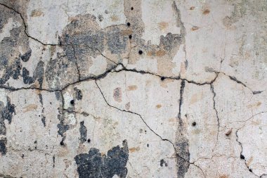 Hasarlı alçılı eski duvarın dokusu.