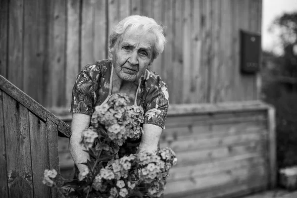 Old Woman Caring Flowers Outdoors Black White Photo —  Fotos de Stock