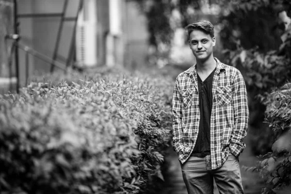 Young Man Standing Outdoors Black White Photo — Stock Photo, Image