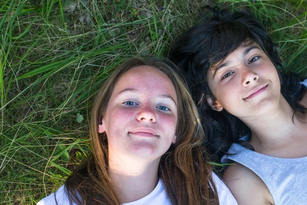 Girls on grass — Stock Photo, Image