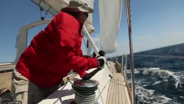 Sailors participate in sailing regatta "12th Ellada Autumn 2014" on Aegean Sea. — Stock Video