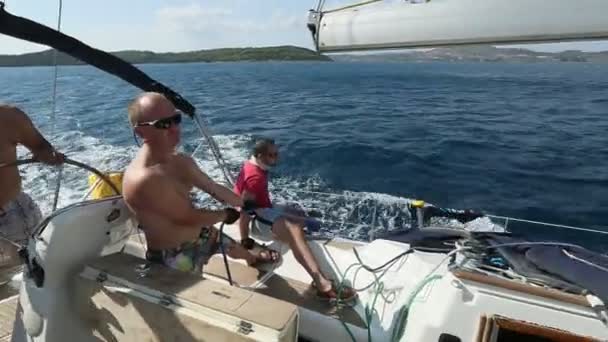 Sailors participate in sailing regatta "12th Ellada Autumn 2014" on Aegean Sea. — Stock Video