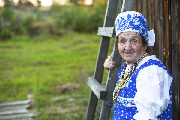 Old woman in Slavic clothing — Stock Photo, Image