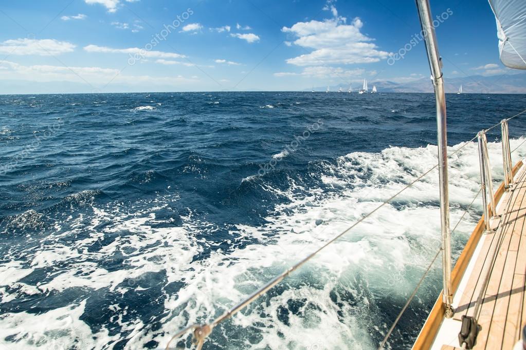 Sailboats participate in sailing regatta