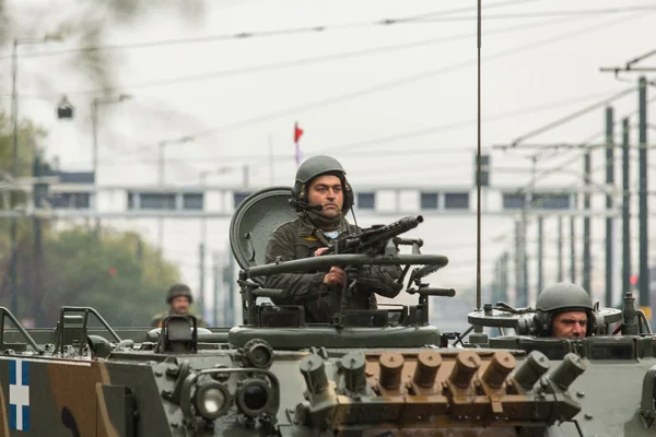 Unidentified participants and military equipment — Stock Photo, Image