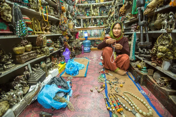 Unidentified woman seller — Stock Photo, Image