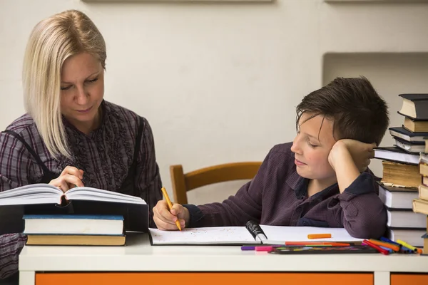 Young student doing homework — Stock Photo, Image