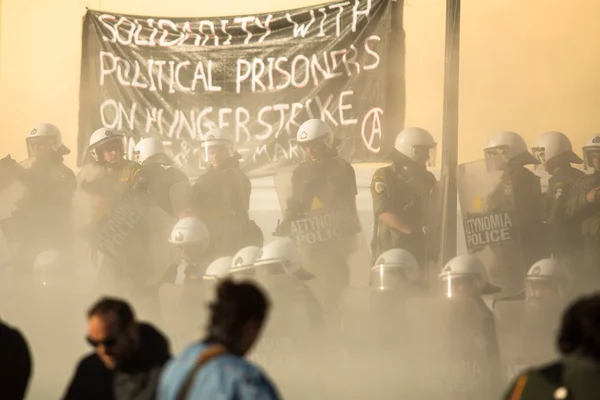 Riot police with their shields — Stock Photo, Image