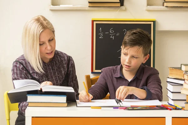 Schoolboy do homework at home — Stock Photo, Image