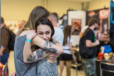 Unidentified participants at International Tattoo Convention