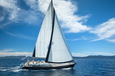 Sailboat participates in sailing regatta
