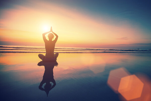 Yoga woman sitting in lotus pose