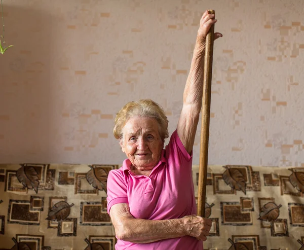 Elderly woman doing rehab exercises — Stock Photo, Image