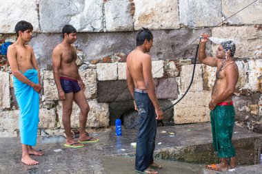 Unidentified refugees wash up on the street