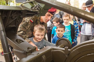 children during demonstration of the military