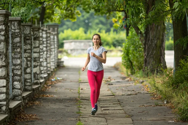 Young girl during  morning jog — Stock Photo, Image