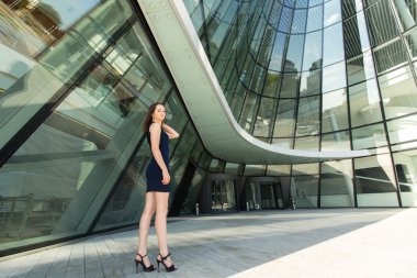 Lady standing near the business center.