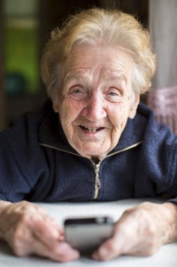 Woman is typing on phone