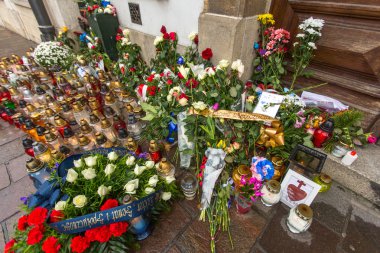 candles and flowers near the General Consulate